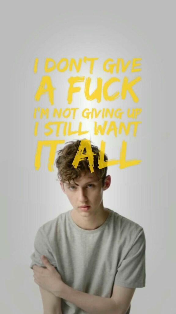 Troye Sivan wallpaper with Fools lyrics in bold yellow text expressing resilience and longing