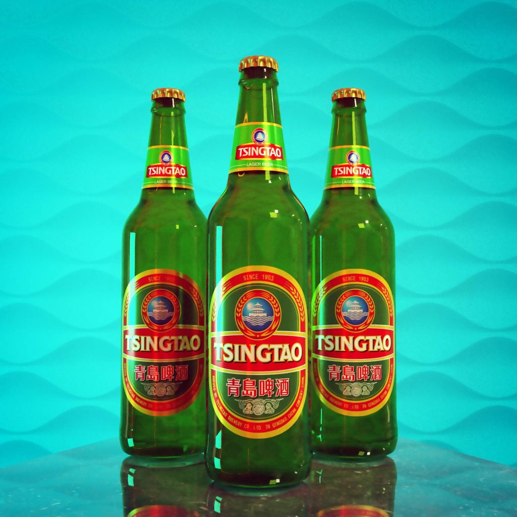 Three green Tsingtao beer bottles on reflective surface with turquoise wavy background wallpaper