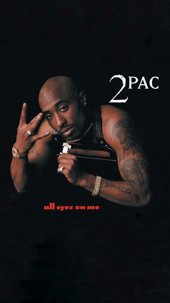 Legendary Rap Icon Tupac Shakur: Capturing the Essence of Influence Wallpaper