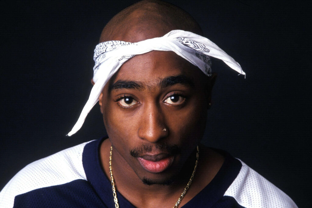 Legendary Tupac Rocks White Bandana in All Its Dope Splendor Wallpaper