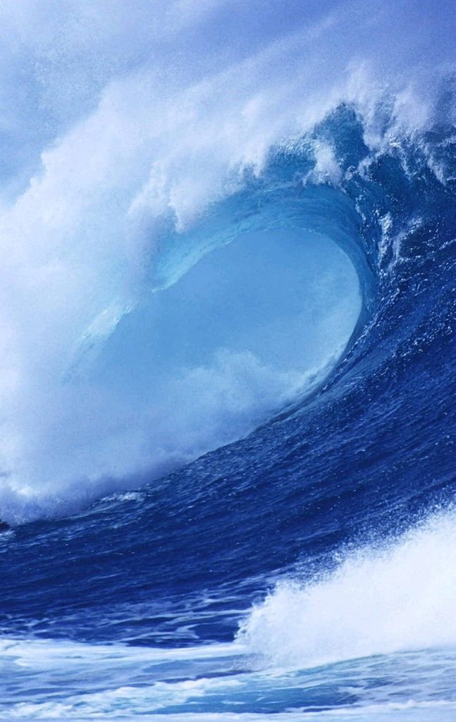 Massive turquoise barrel wave crashing with white spray ocean iPhone wallpaper background sea energy
