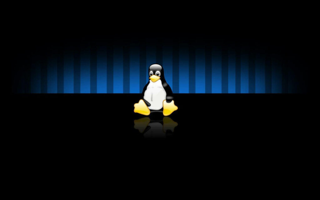 The Iconic Mascot Tux Gracing an Awe-inspiring Linux Desktop Background Wallpaper
