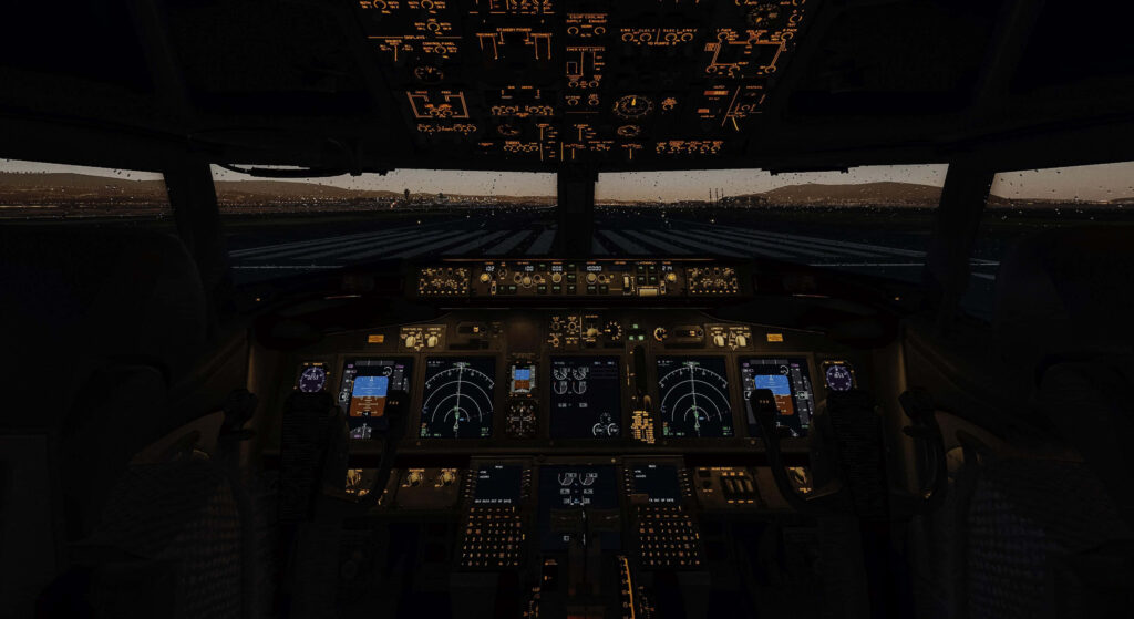 Twilight airplane cockpit view with glowing instruments and runway stretching into evening sky wallpaper