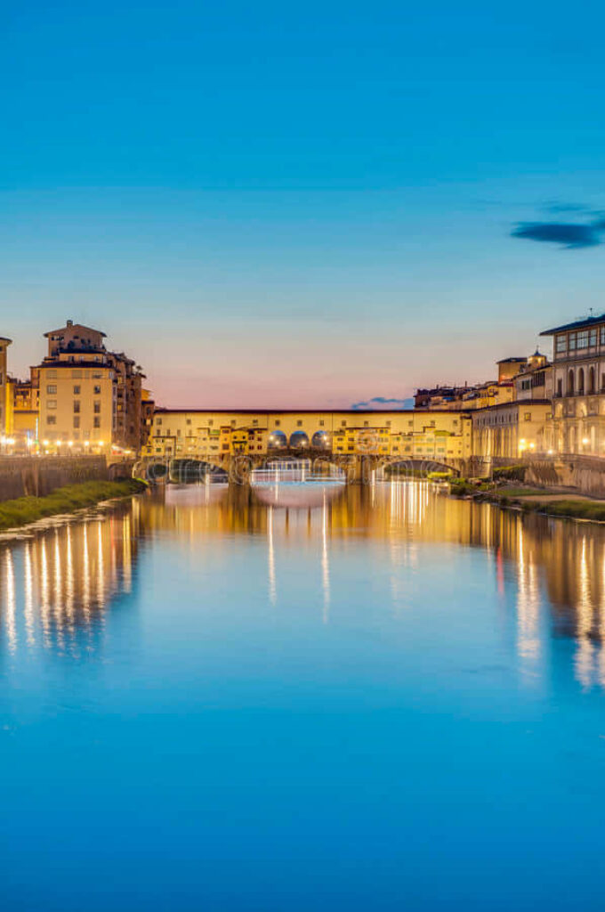 Twilight Reflections of Ponte Vecchio Bridge in Florence Wallpaper