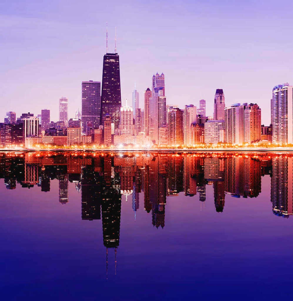 Twilight City Skyline Wallpaper: Reflections in Calm Water