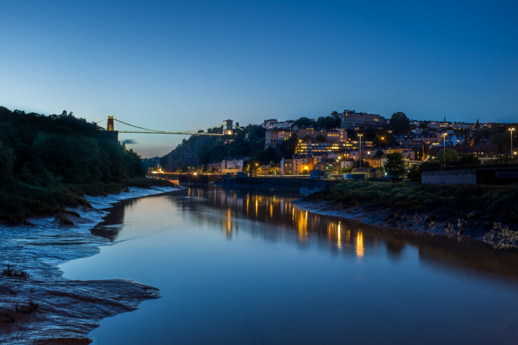 Stunning Twilight Cityscape with Bridge Reflection - Wallpaper Background