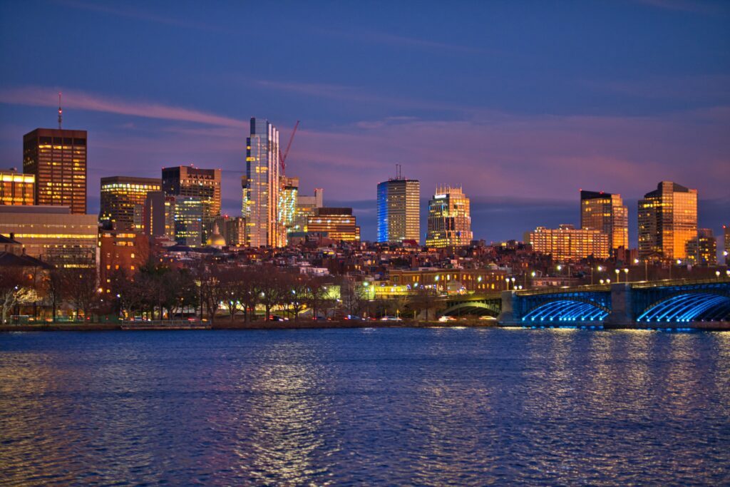 Vibrant Twilight Cityscape Wallpaper: Modern Architecture & Reflections