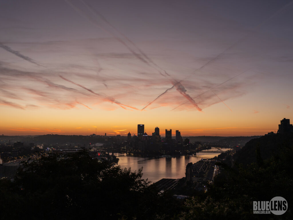 Twilight Cityscape Wallpaper: Serene Urban Skyline Reflection