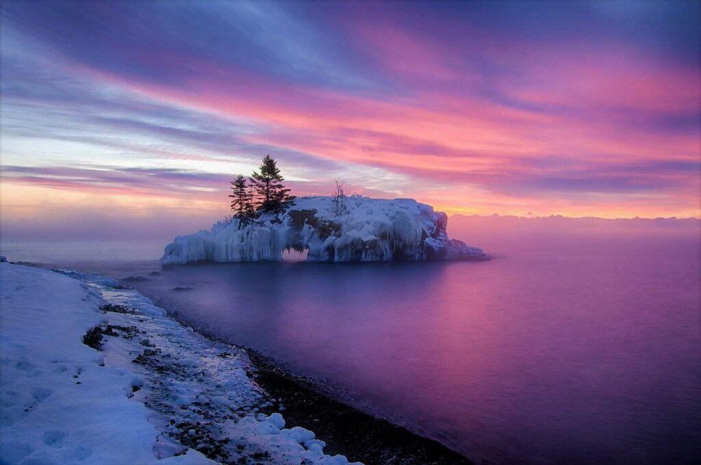Twilight Serenity: A Winter Paradise on a Frozen Island Wallpaper