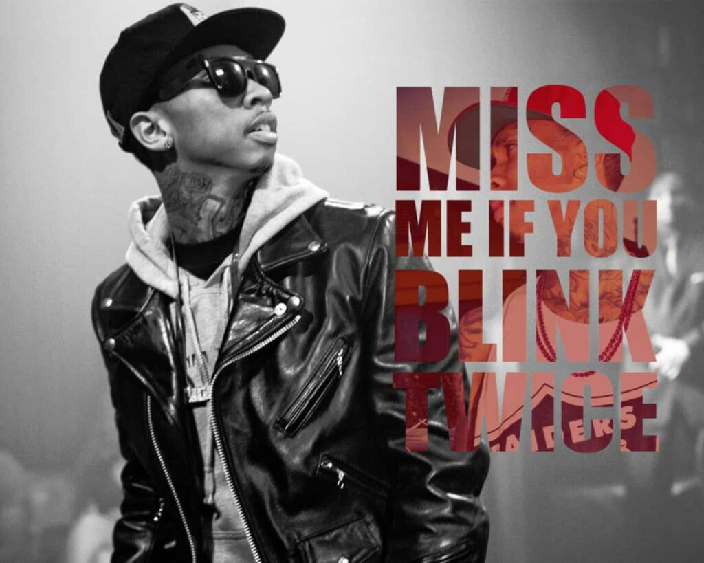 Tyga Rocks Leather Jacket and Sunglasses - Bold Live Performance Wallpaper