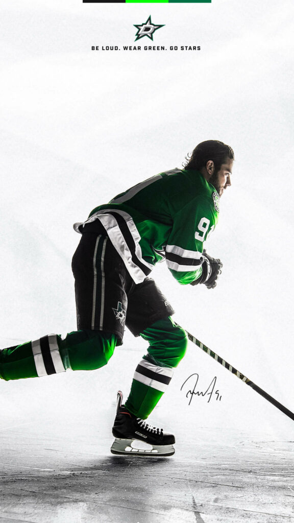 Tyler Seguin Dallas Stars hockey wallpaper in green uniform with autograph and team logo