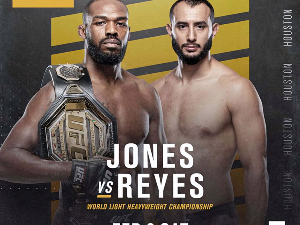 Jon Jones UFC 247 Light Heavyweight Champion with belt and Dominick Reyes bold gold black wallpaper
