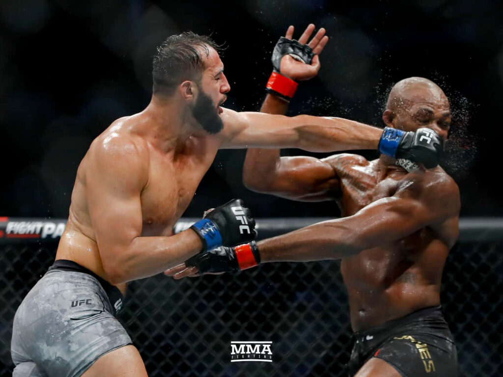 UFC 247 Light Heavyweight Championship Jon Jones versus Dominick Reyes intense action wallpaper