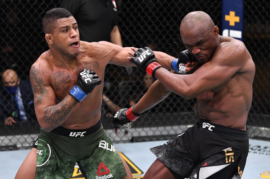 Gilbert Burns lands a powerful punch on Kamaru Usman in intense UFC 258 welterweight fight Wallpaper