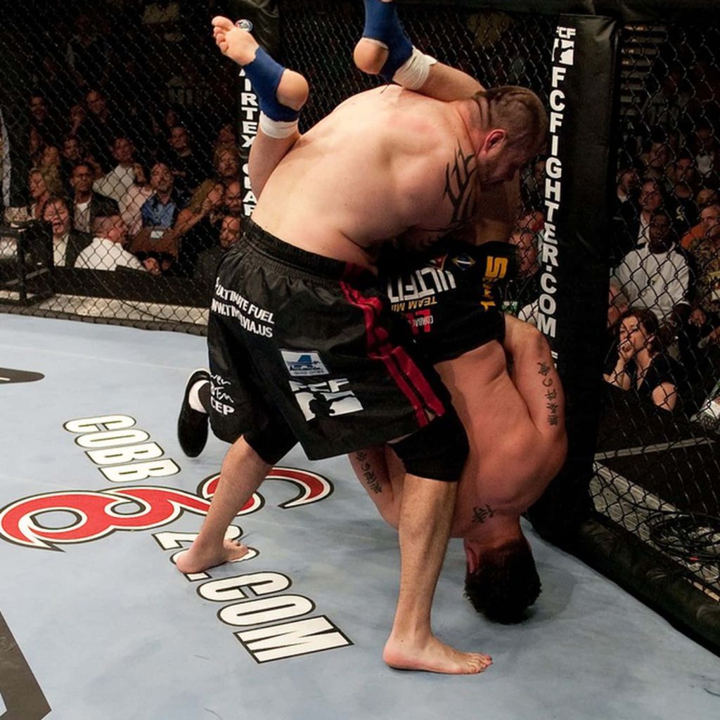 Tim Sylvia and Frank Mir intense grappling fight UFC 48 Octagon MMA wallpaper background