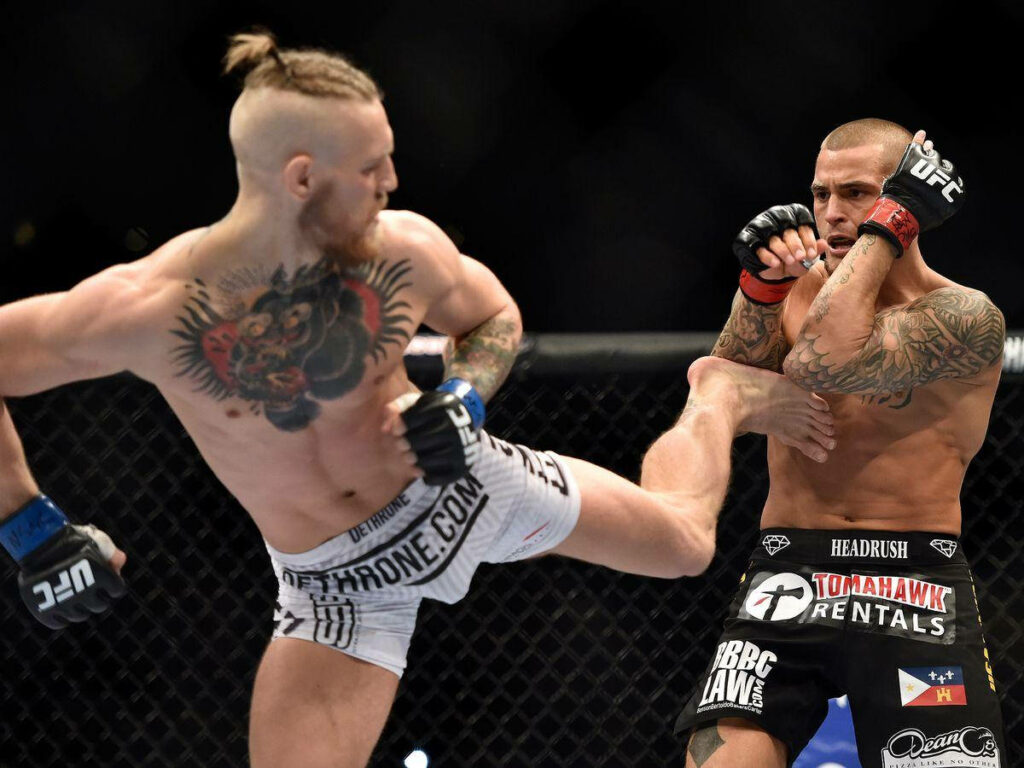 UFC Fight Wallpaper: Conor McGregor vs Dustin Poirier Action Scene