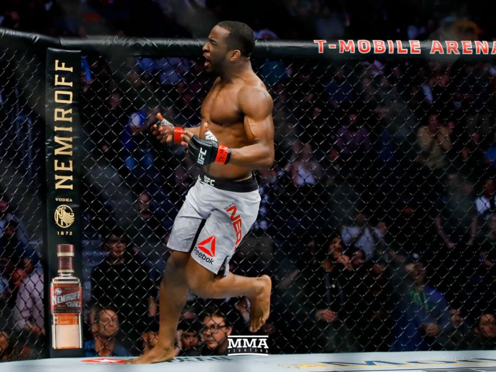 UFC fighter Geoff Neal in action inside T-Mobile Arena octagon under bright lights wallpaper