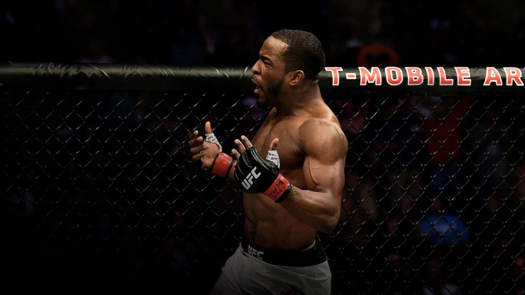 UFC fighter Geoff Neal intense action shot T-Mobile Arena high contrast MMA wallpaper background