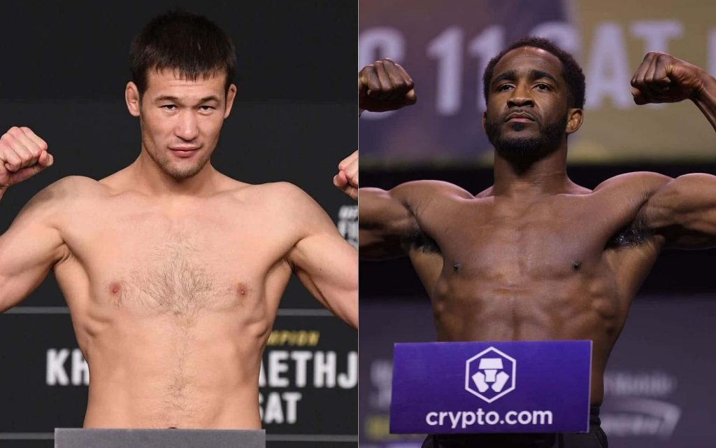 UFC wallpaper of Shavkat Rakhmonov and Geoff Neal intense official weigh-in in dark arena