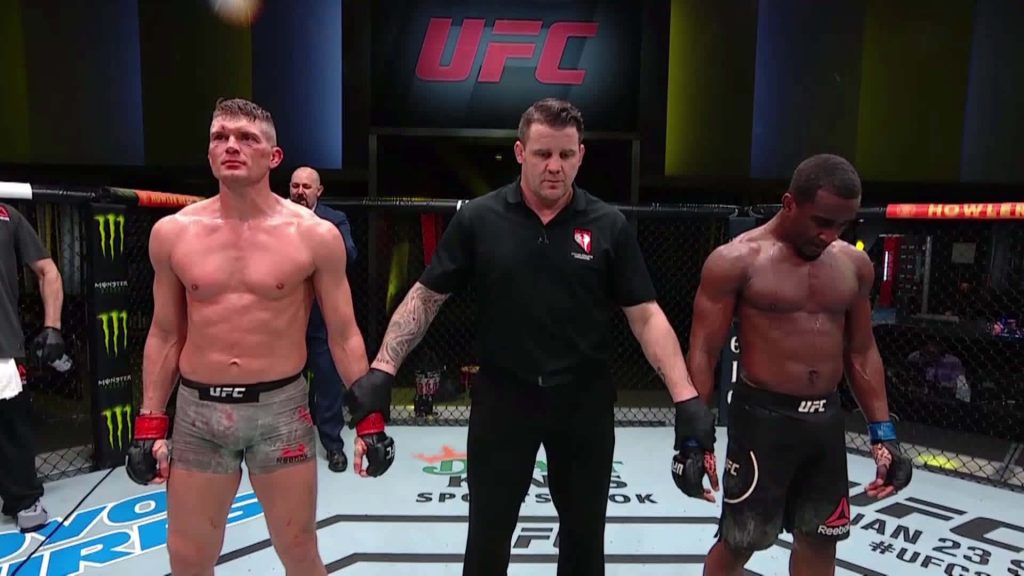 UFC wallpaper featuring Geoff Neal and Stephen Thompson with referee Herb Dean in octagon