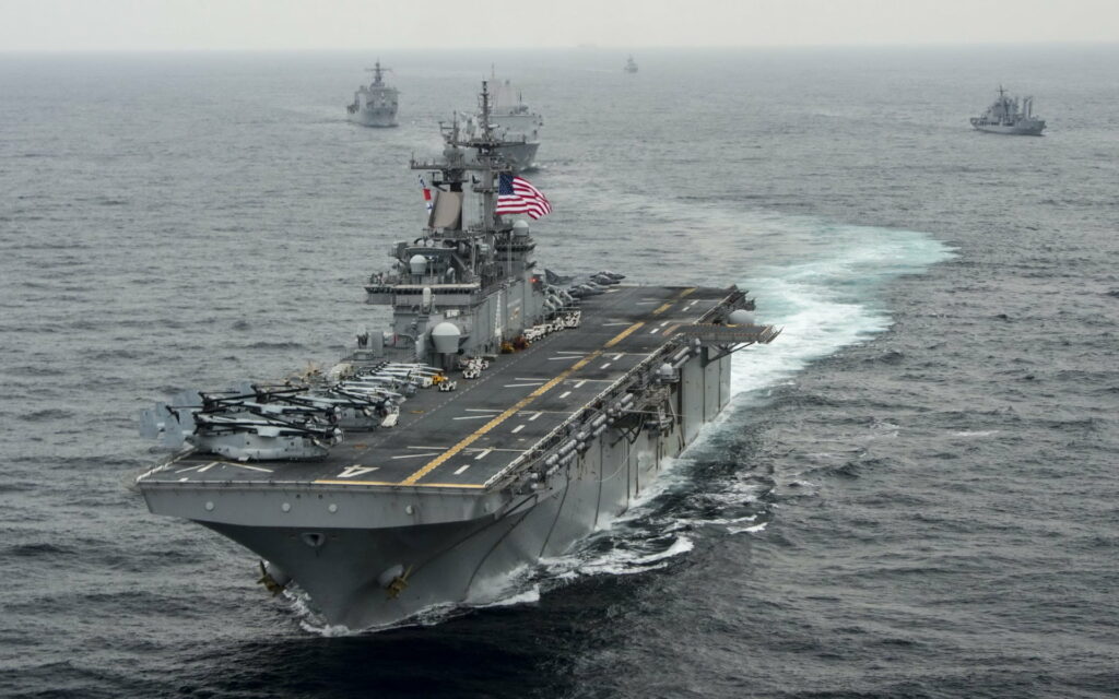 USS Boxer: Dominating the Seas with Marine Power - L-4 Wasp-class Amphibious Assault Ship HD Wallpaper Featuring CH-53 Sea Stallion and V-22 Osprey