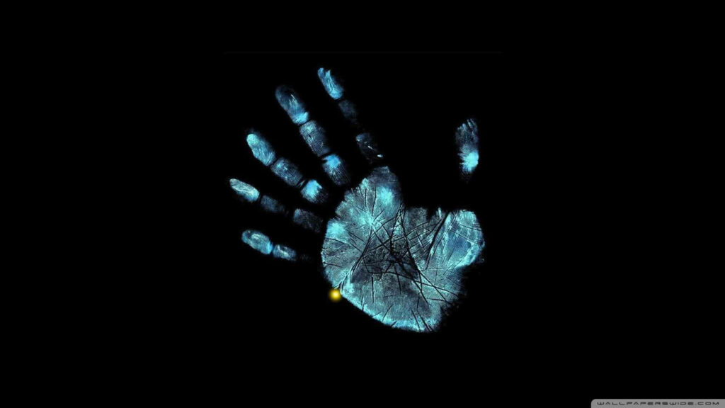 A Haunting Handprint: The Fringe Effect on Dark Laptop Wallpaper