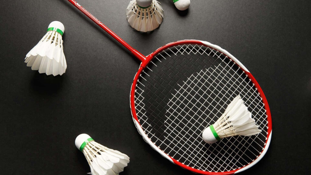 Badminton and Shuttlecock on Black Dark Background Wallpaper