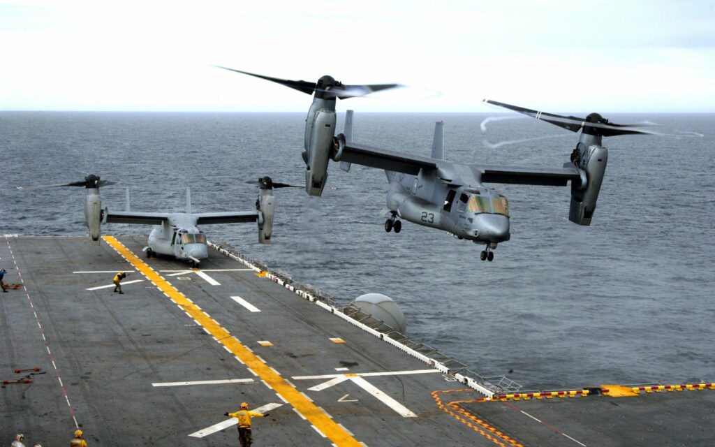 Ultimate Flexibility: Bell V-22 Osprey Takes Flight - USA's Cutting-Edge Tiltrotor in Action Wallpaper