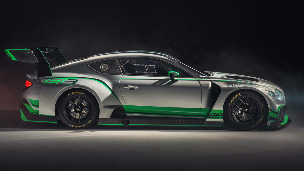 Blazing Speed: A Striking HD Image of Bentley Continental GT3 Race Car Mirroring its Dazzling Aura against a Sleek Black Background Wallpaper