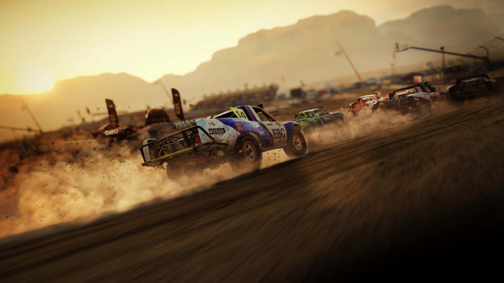 Thrilling dirt rally race with car cornering on dusty track Wallpaper
