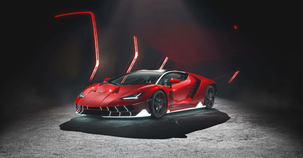 Ultra HD red Lamborghini in dramatic spotlight with sharp light accents and modern background Wallpaper