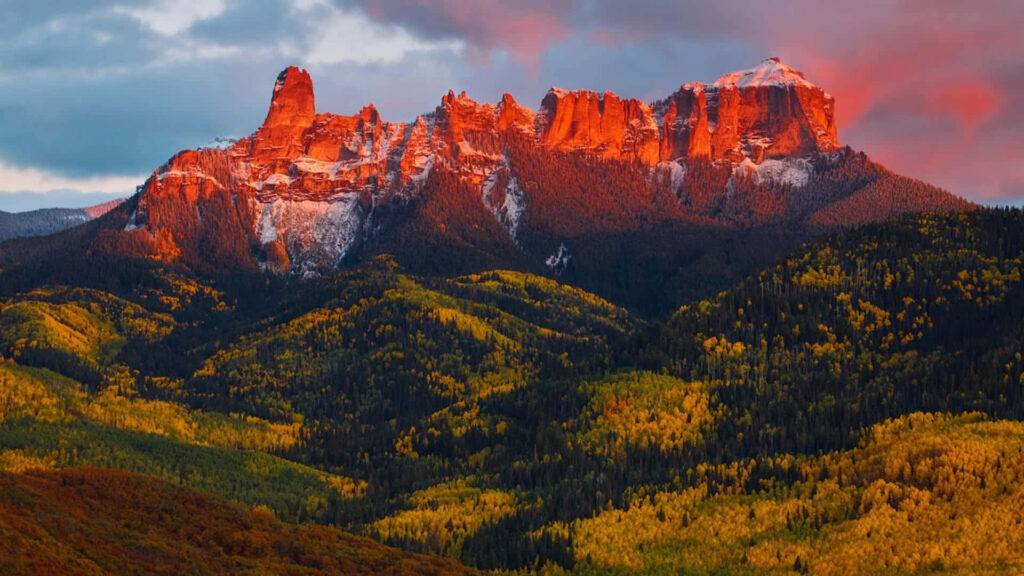 Uncompahgre National Forest autumn foliage and red cliffs at sunset scenic Colorado landscape Wallpaper