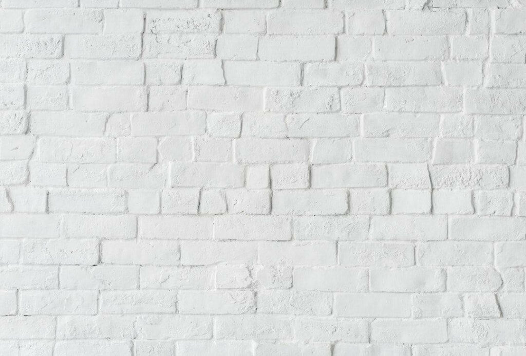 Textured white brick wall background with modern pattern Wallpaper