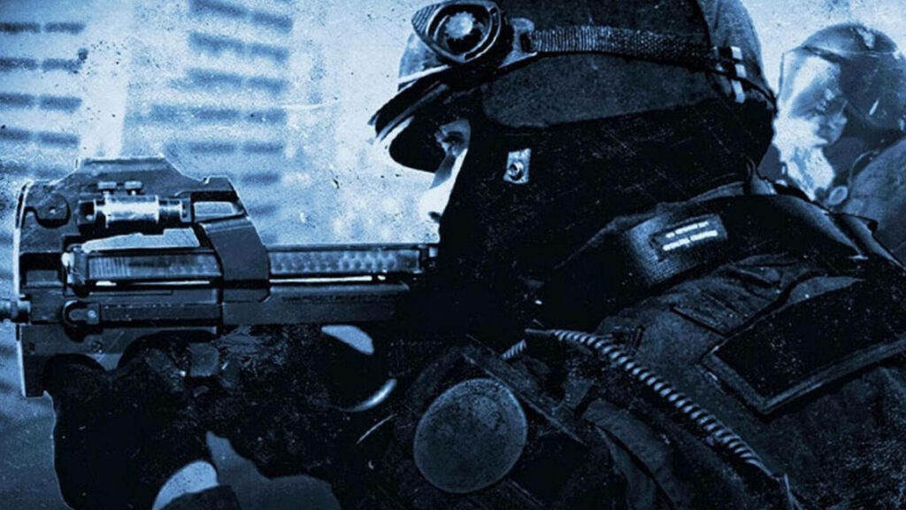 Shadowed Warrior: Grayscale depiction of a Counter Strike Global Offensive protagonist, poised with firearm against an urban backdrop Wallpaper