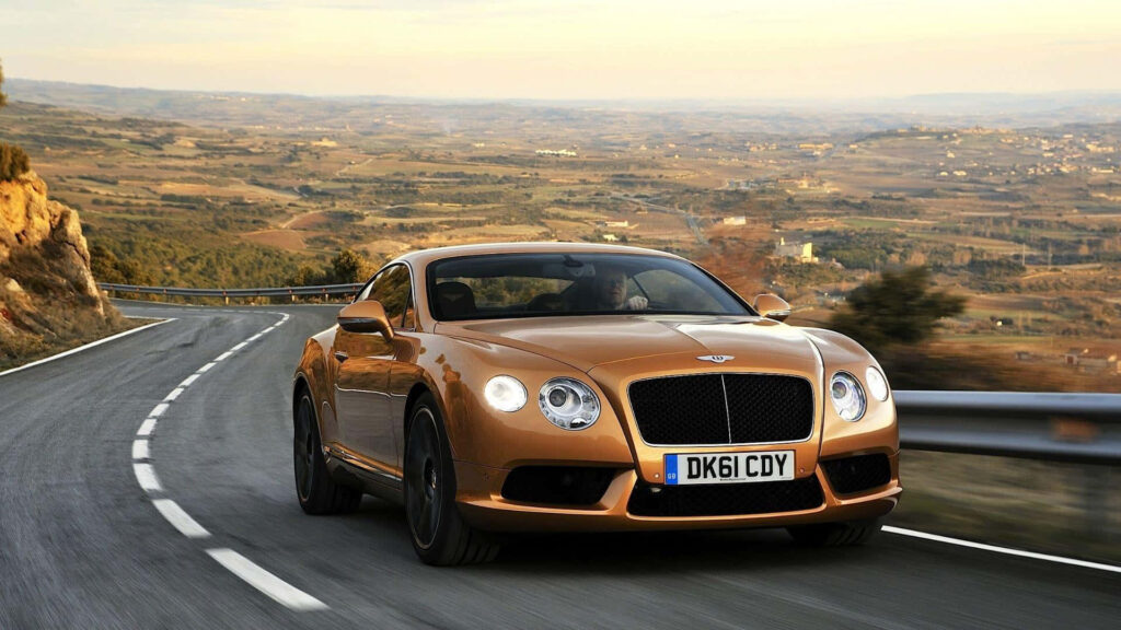 Unforgettable Ride: Unmatched Luxury and Power with the Best Bentley Wallpaper