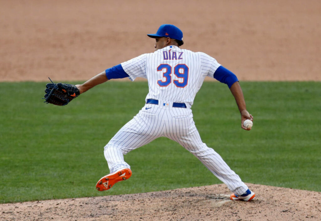 Edwin Diaz Mid-Pitch: Uniformed Baseball Wallpaper Background
