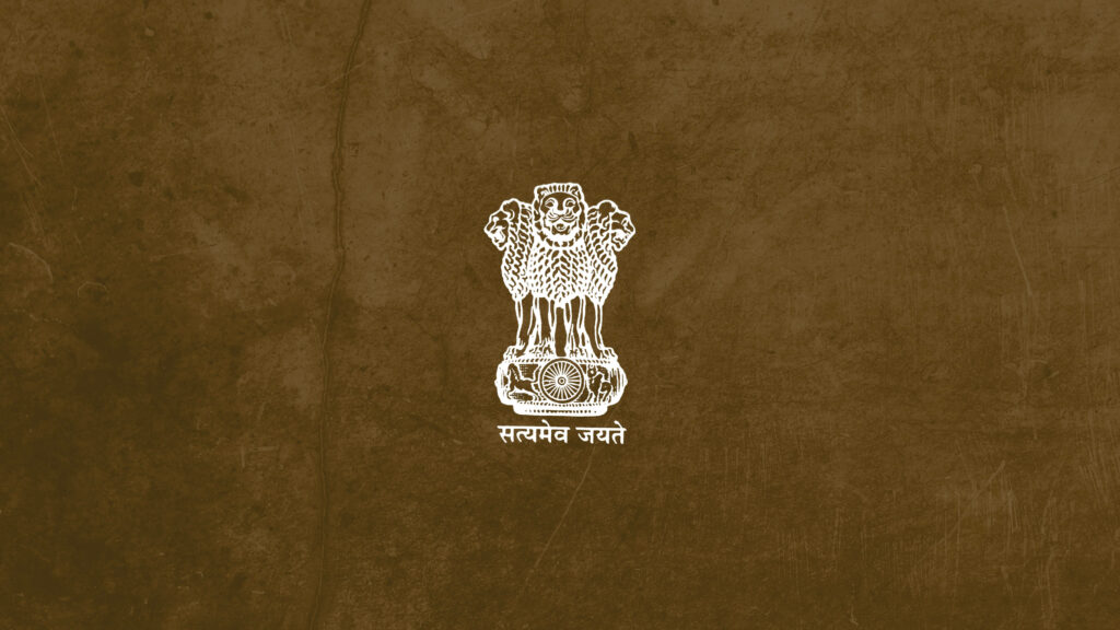 Symbolic Emblem of India's Prestigious Union Public Service Commission (UPSC) Against Rich Brown Texture - Upsc Background Image Wallpaper