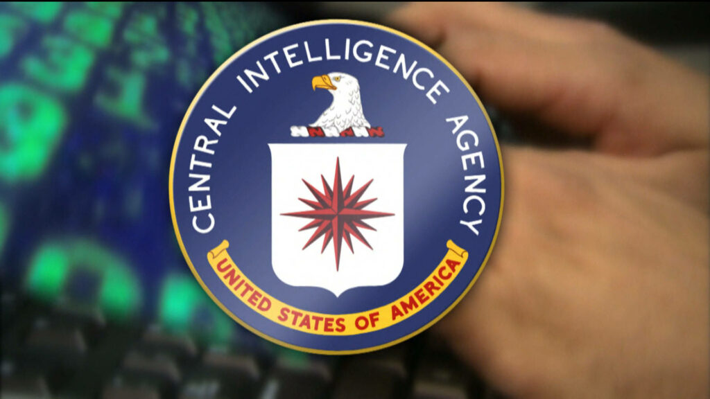 Official CIA logo wallpaper with eagle shield red compass star on digital blurred background