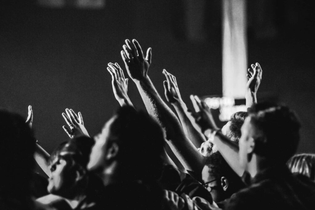 Expressive Black and White Wallpaper Capturing Unity in Worship