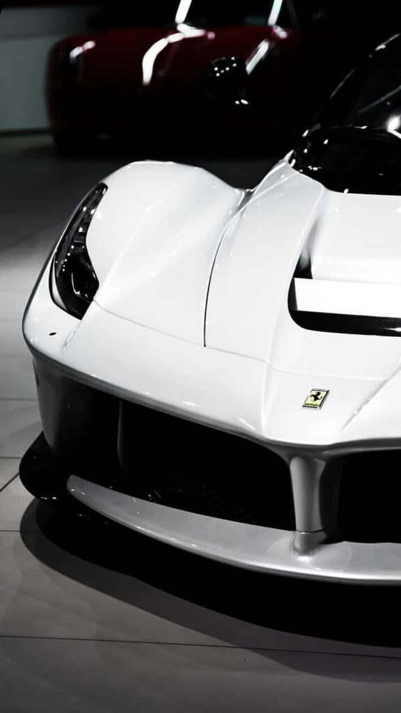 Exude Style and Elegance with the White Ferrari iPhone: A Luxurious Statement in a Modern Design Wallpaper