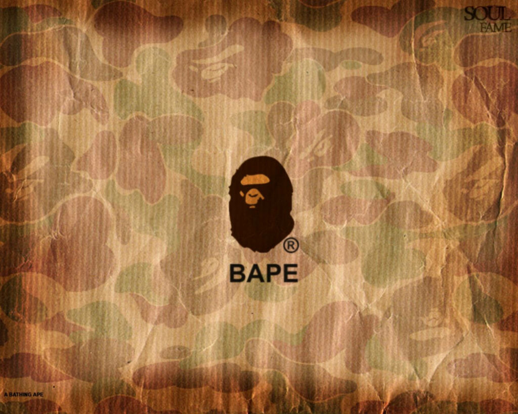 BAPE Logo on Earthy Camo Background: Street Fashion Ruffled Bag Design Wallpaper