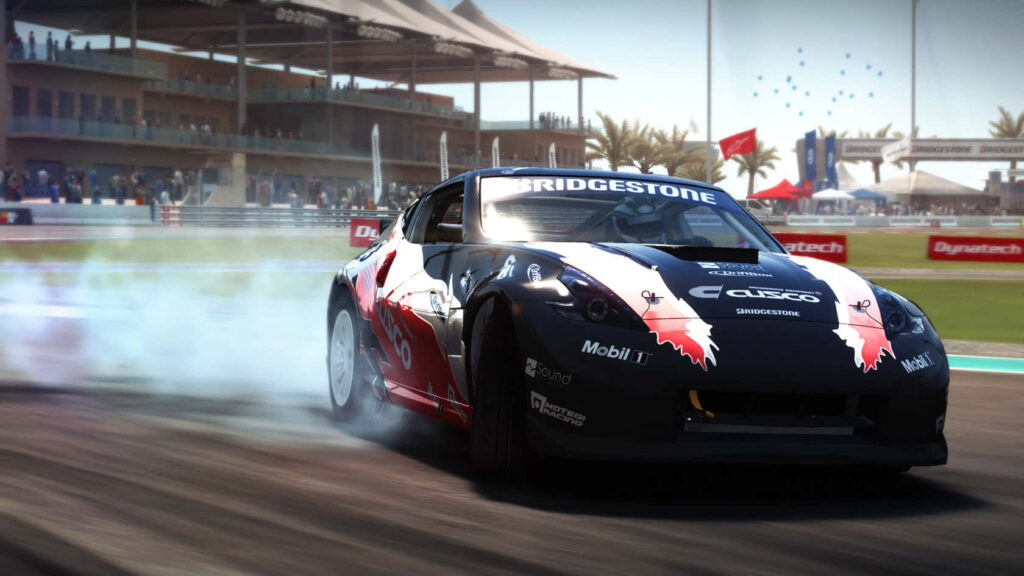 Sleek black race car drifting in Grid Autosport with sponsor logos Wallpaper