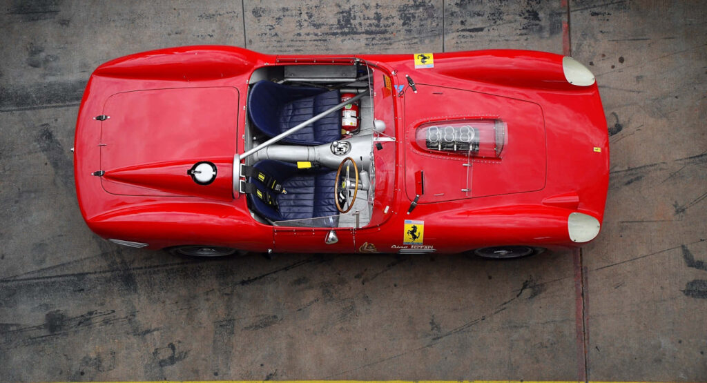 Unleashing Adrenaline: Experience the Thrill of Exploration and Liberation Behind the Wheel of a Classic Ferrari Wallpaper