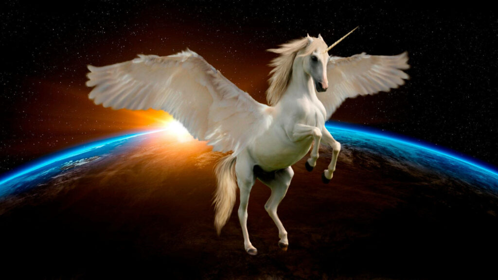 Majestic white alicorn flying above Earth with golden sunrise and vibrant blue atmosphere in space Wallpaper