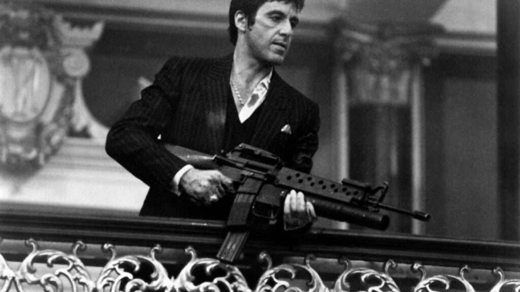 The Unforgettable Scarface Moment: Antonio Montana and His Little Friend Wallpaper