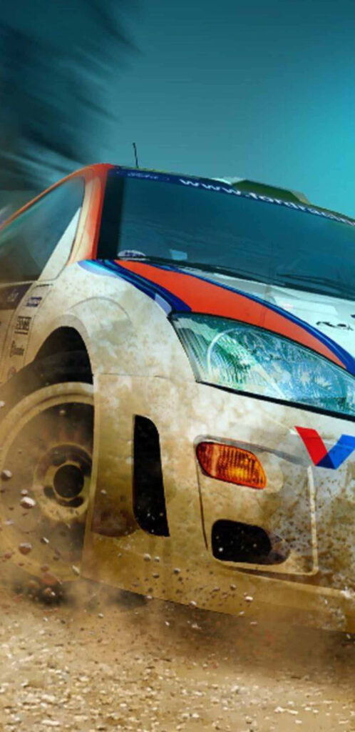 Intense Speed: Dirt-Covered Rally Car Racing Through Stage Wallpaper