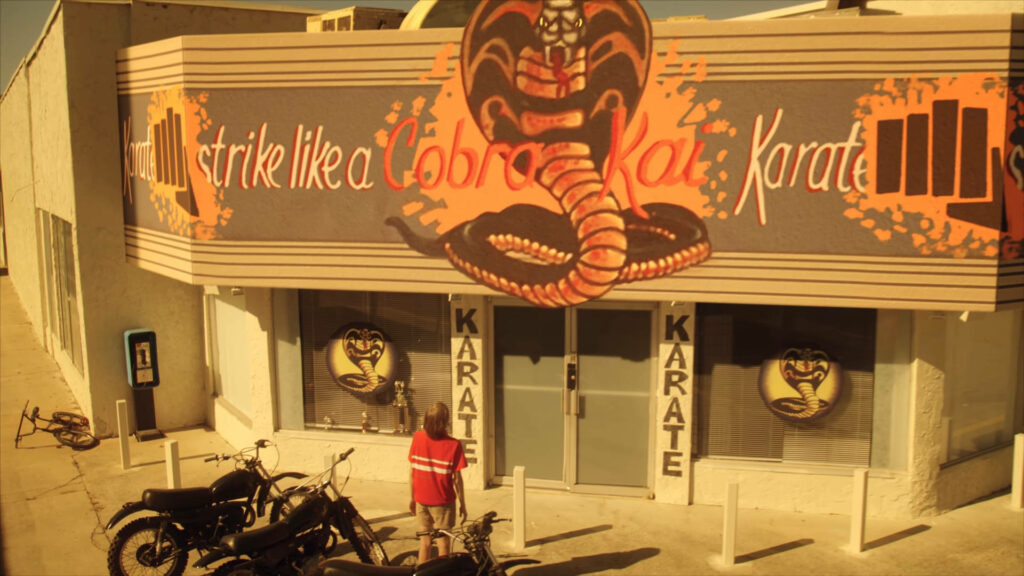 Cobra Kai Dojo Wallpaper: Strike First, Strike Hard, No Mercy
