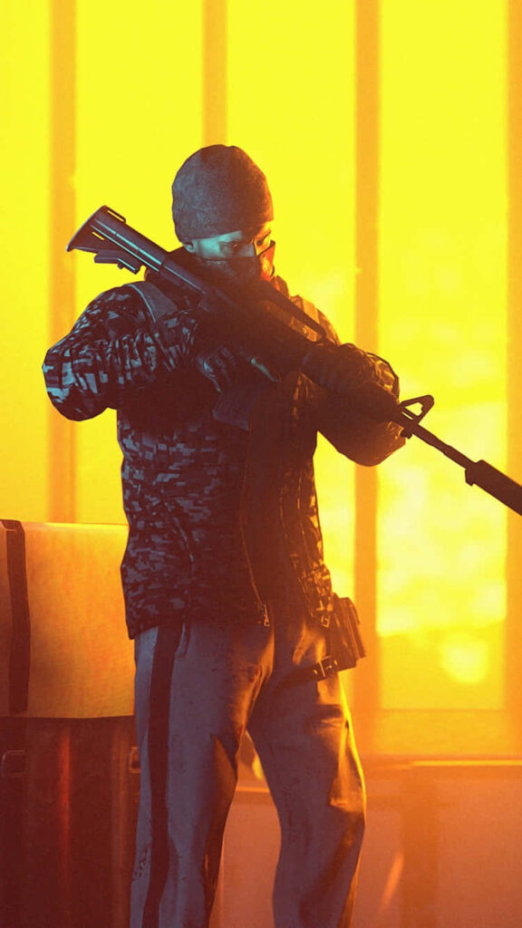 Intense PUBG Character Silhouetted in Combat Ready Pose on Vibrant Yellow Background - Android Wallpaper