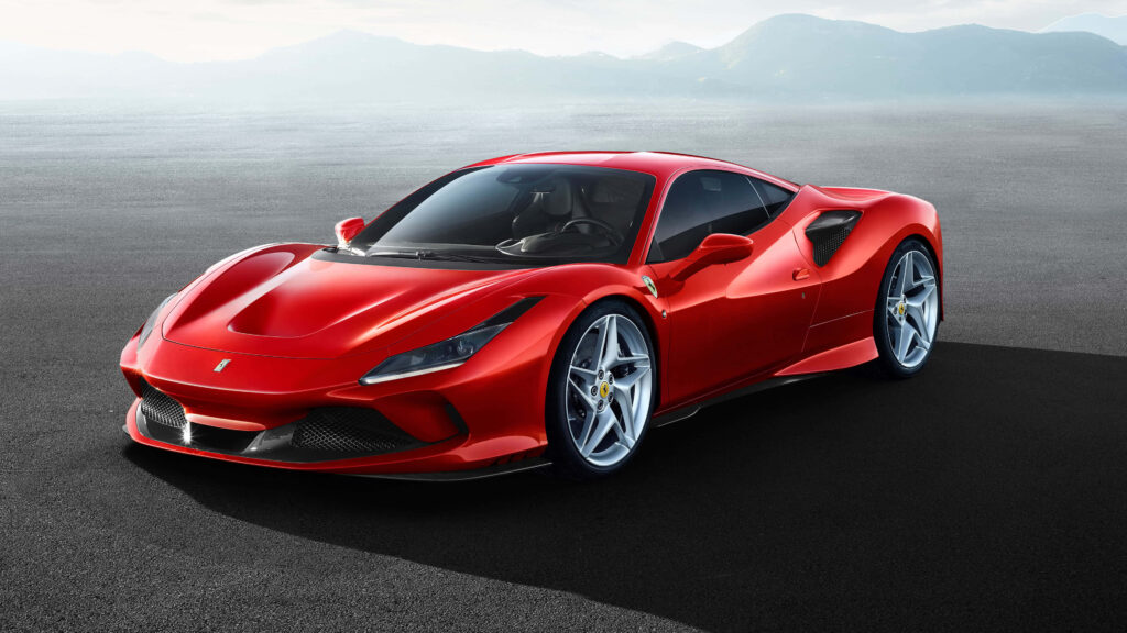 Unleash Your Inner Speed Demon with this Dazzling Ferrari Supercar. Experience the Perfect Blend of Power, Elegance, and Sophistication. Prepare to Captivate onlookers with this Exquisite Automotive Masterpiece. Breathtaking Backdrop of Supercar Excellence. Wallpaper
