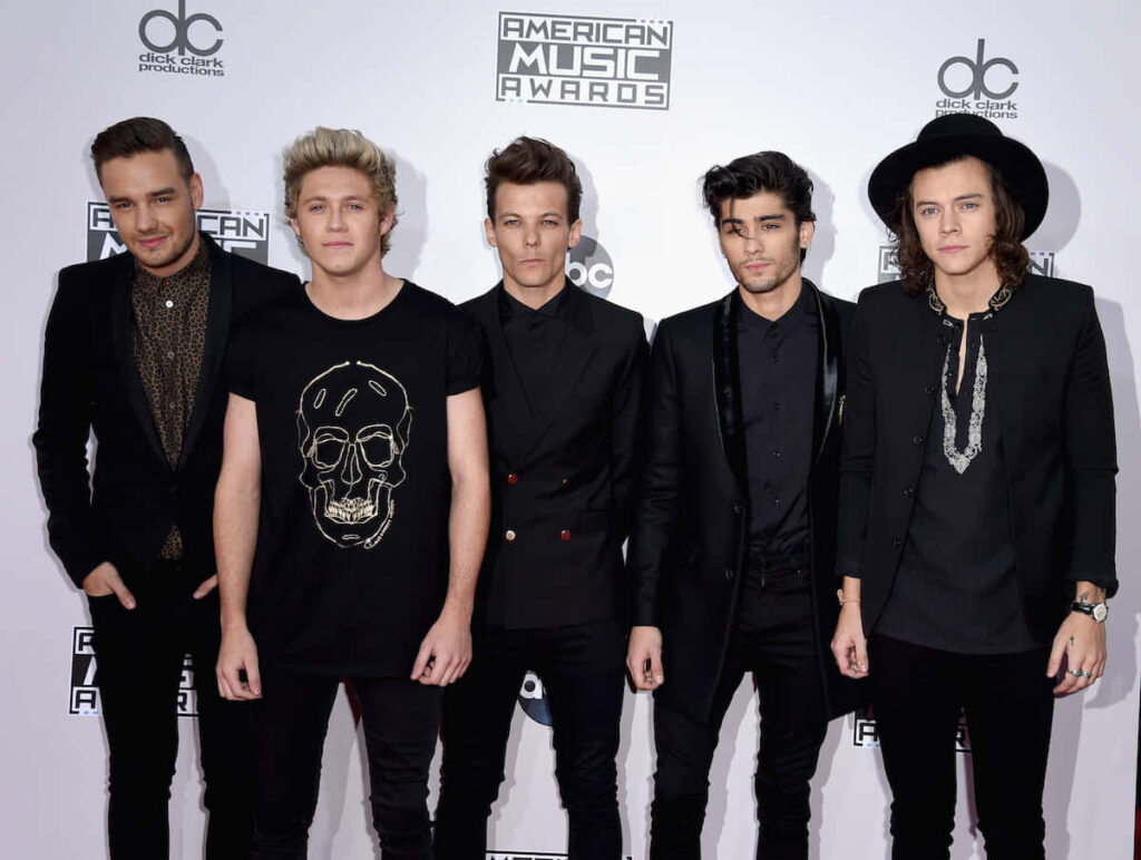 Direction's Vibrant Musical Journey with Niall, Liam, Harry, Louis, and Zayn Wallpaper